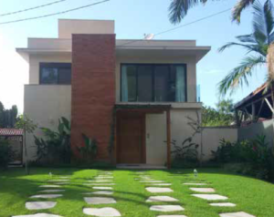 Foto casa com grama esmeralda